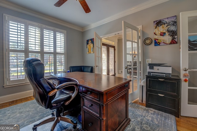 office space with french doors, ceiling fan, ornamental molding, and wood-type flooring