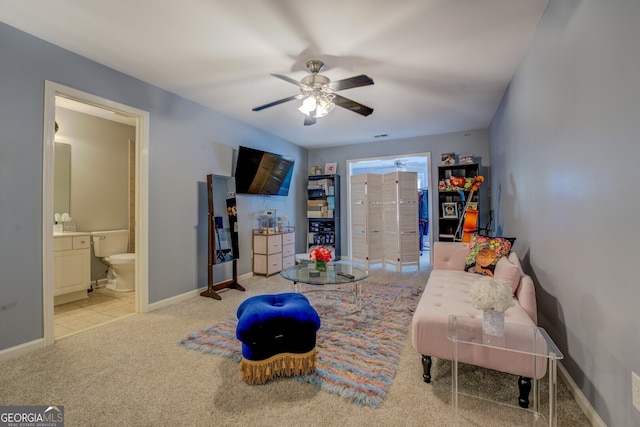 game room with light carpet and ceiling fan