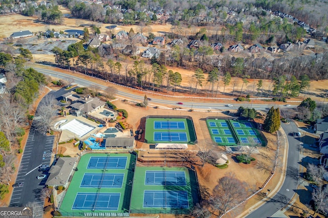 birds eye view of property with a residential view