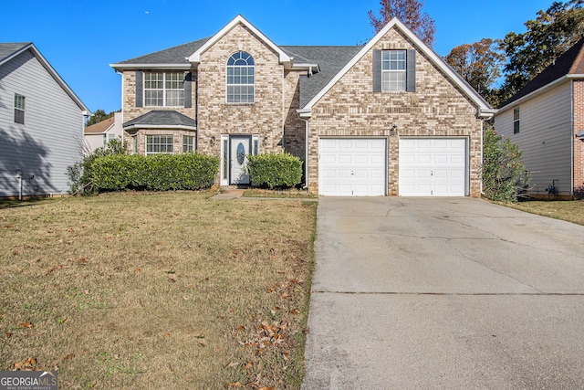 front facade featuring a garage and a front lawn