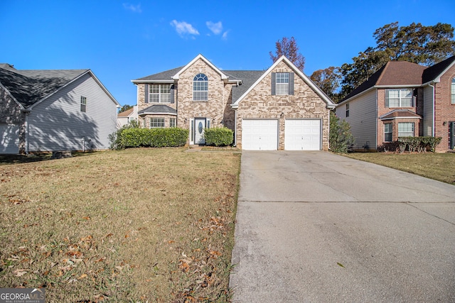 front of property featuring a front yard and a garage