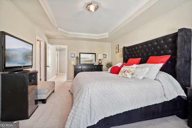 bedroom featuring a raised ceiling, crown molding, and light colored carpet