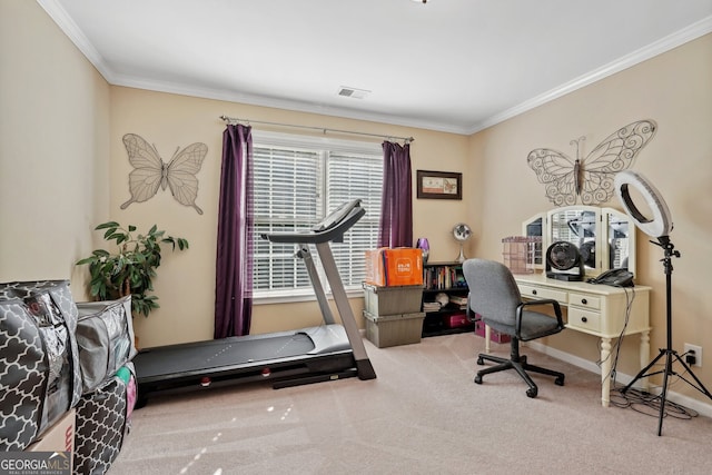 workout area with light colored carpet and crown molding