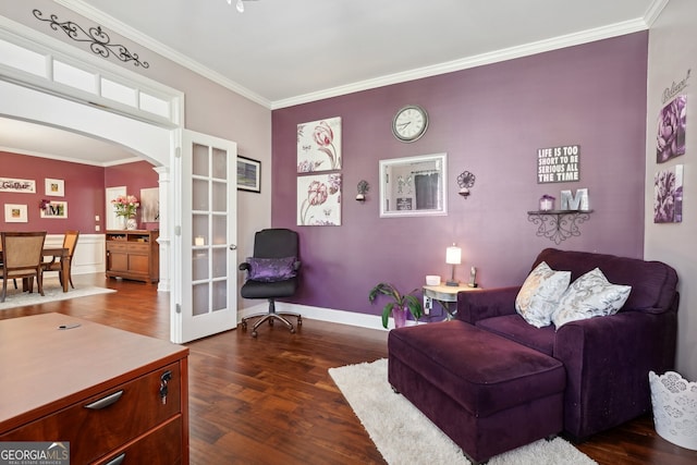 living room with dark wood-type flooring and ornamental molding