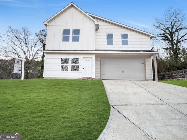 view of front facade featuring a front yard and a garage