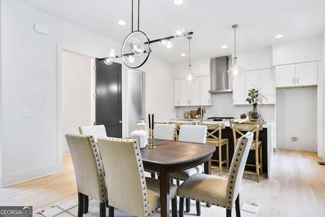 dining room with light hardwood / wood-style flooring