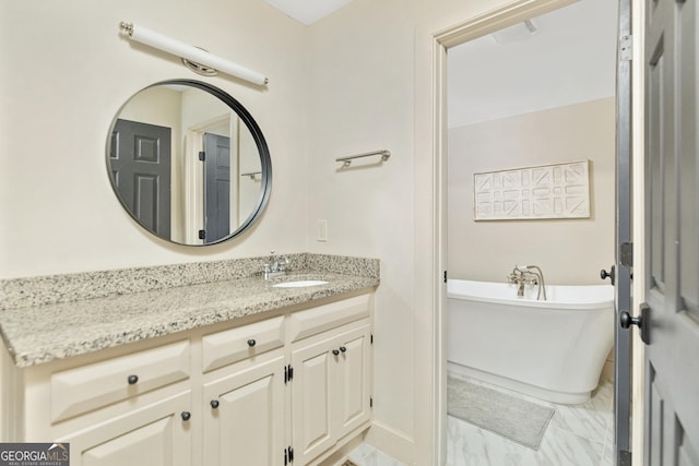 bathroom featuring a bathtub and vanity