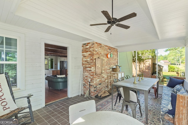 view of patio featuring ceiling fan