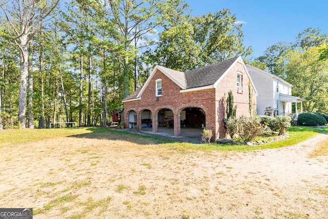 view of home's exterior with a lawn