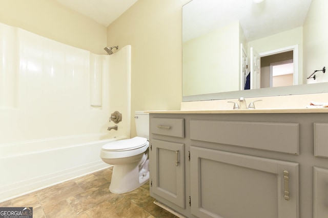 full bathroom featuring shower / bathing tub combination, vanity, and toilet