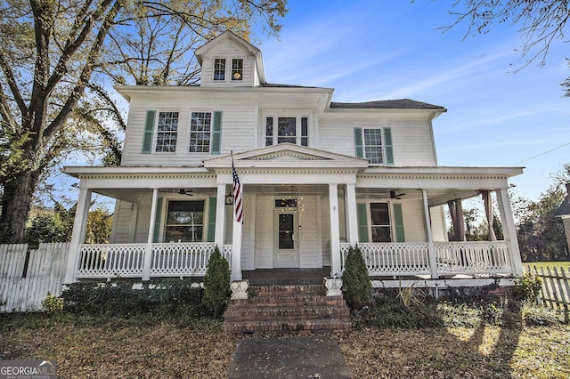 farmhouse inspired home featuring covered porch