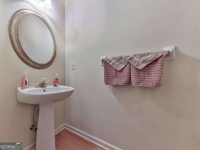 bathroom featuring hardwood / wood-style floors