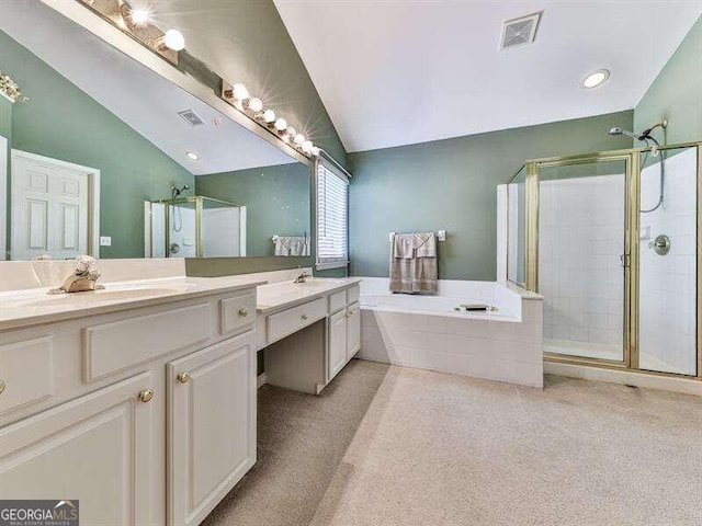 bathroom with vanity, plus walk in shower, and vaulted ceiling