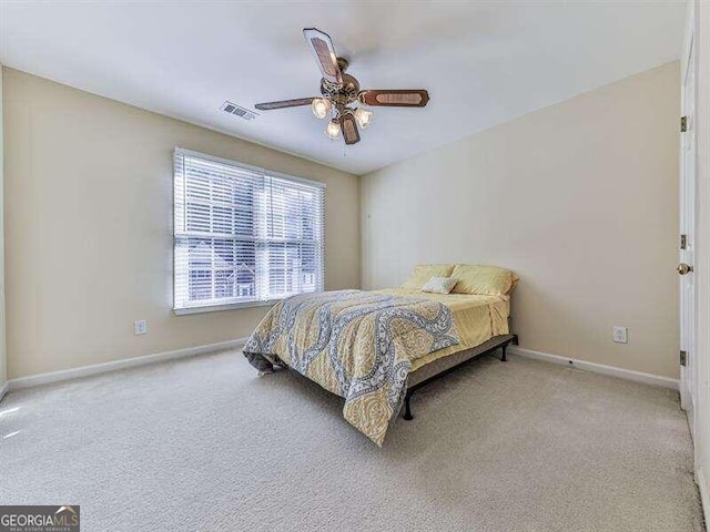 bedroom featuring carpet flooring and ceiling fan