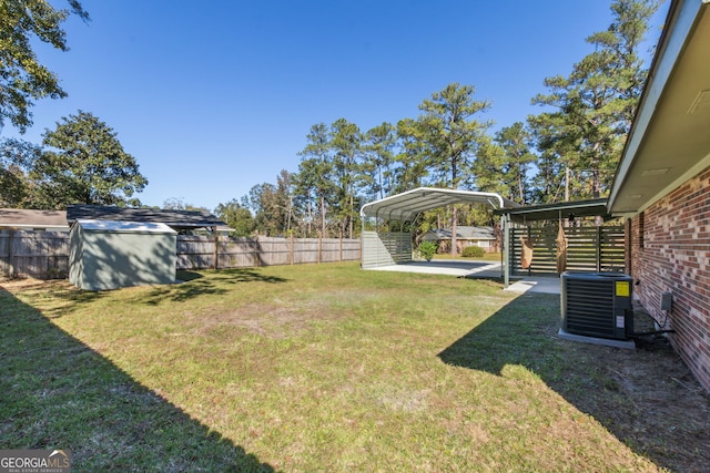 view of yard featuring a shed, a carport, and cooling unit