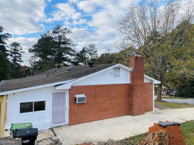 view of home's exterior with a patio area