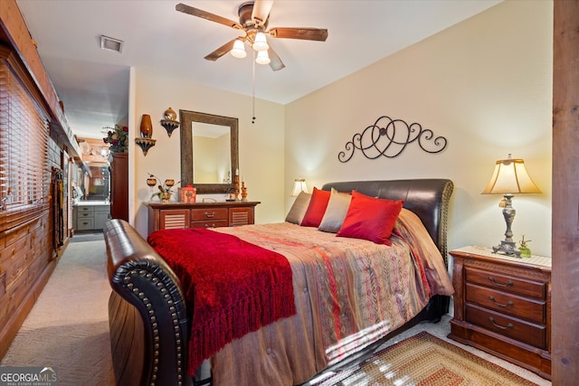 bedroom featuring ceiling fan and light colored carpet