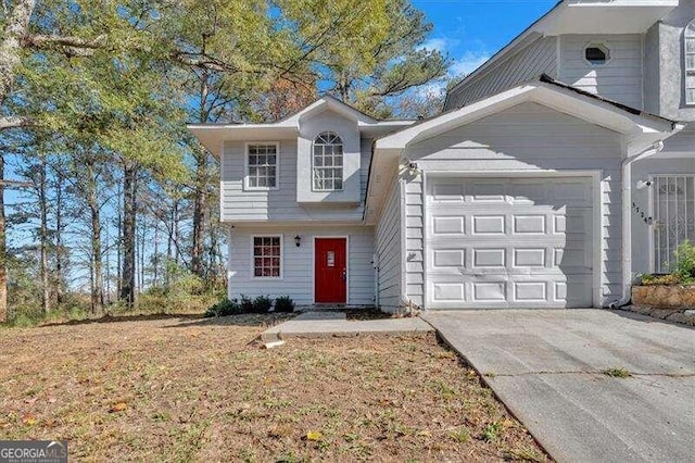 front of property featuring a garage