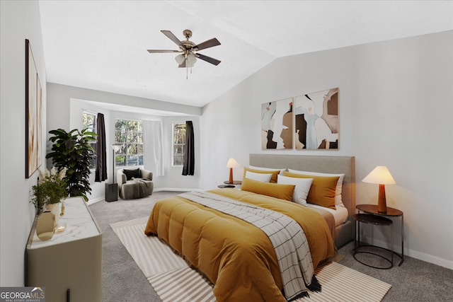 bedroom with light carpet, vaulted ceiling, and ceiling fan