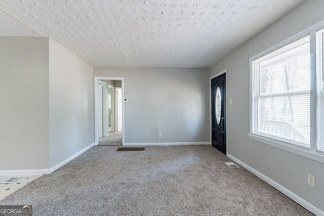 unfurnished bedroom featuring a closet and carpet