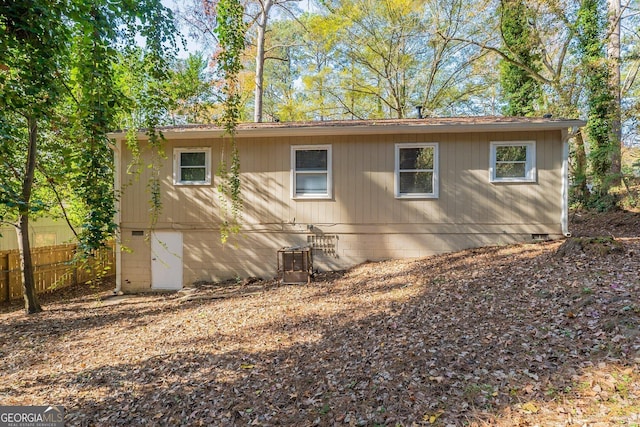 view of property exterior with central AC unit