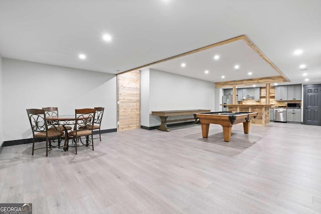 game room with light wood-type flooring and pool table