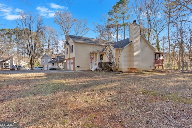 view of property exterior with a garage