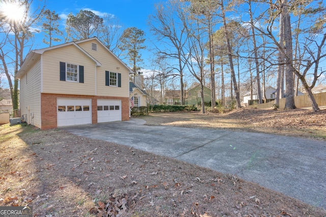 view of property exterior with a garage