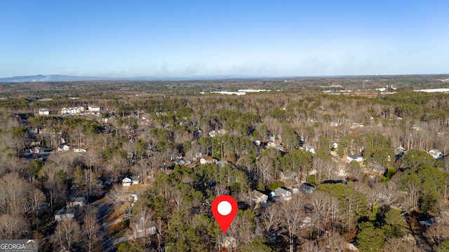 drone / aerial view featuring a mountain view