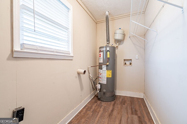 utility room with gas water heater