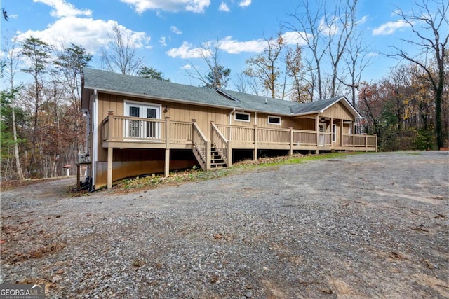 view of front of house featuring a deck