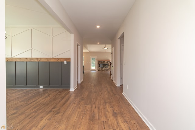 corridor with dark hardwood / wood-style floors