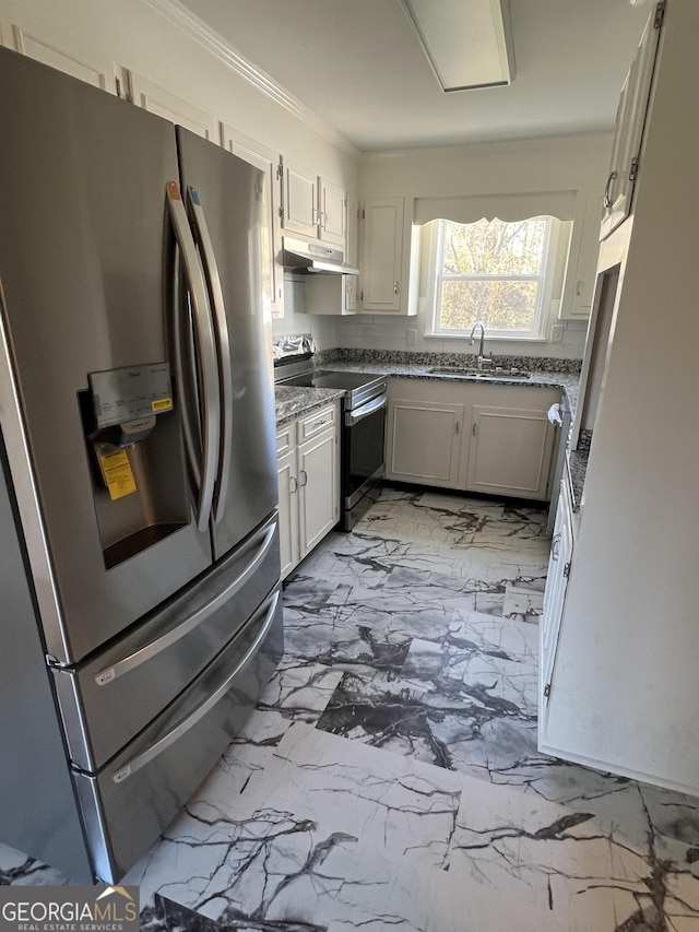 kitchen with white cabinets, crown molding, sink, and appliances with stainless steel finishes