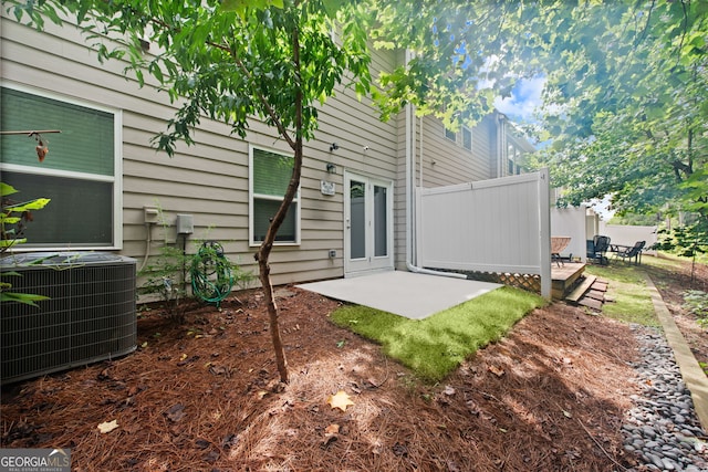 view of yard featuring a patio and cooling unit