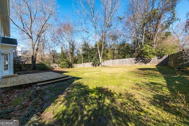 view of yard with a deck