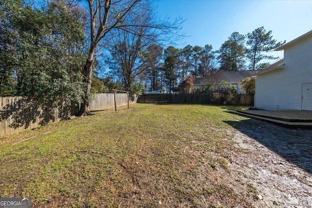 view of yard with a deck