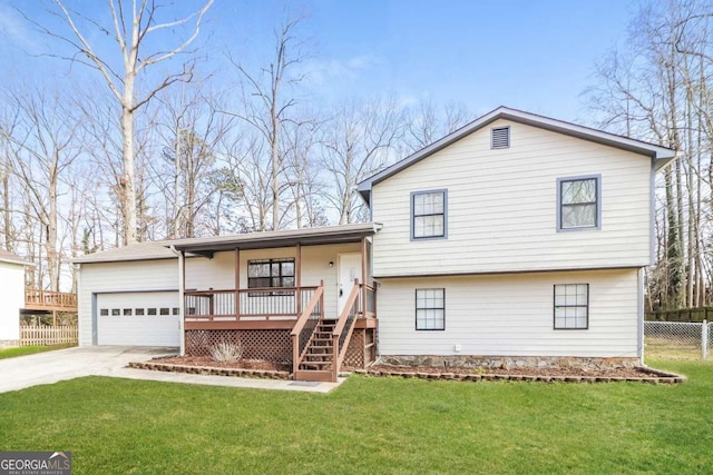 split level home with a front lawn and a porch