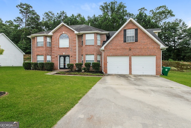 view of front of property featuring a garage, french doors, and a front lawn