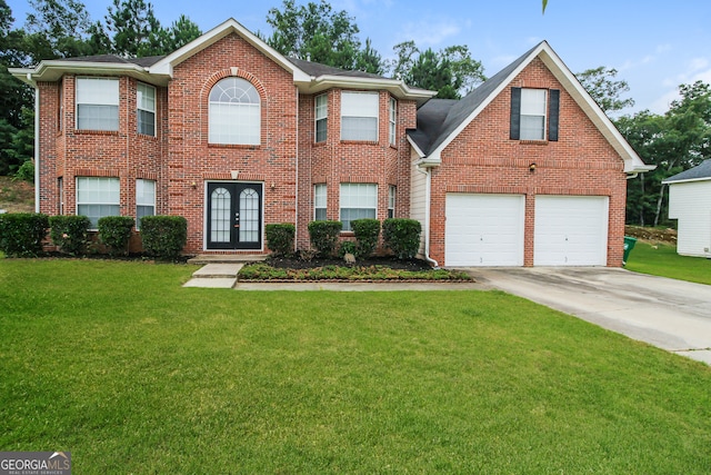 view of front facade featuring a front yard, french doors, and a garage