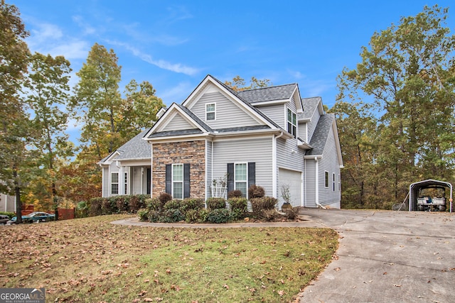 view of front of home with a front yard and a garage