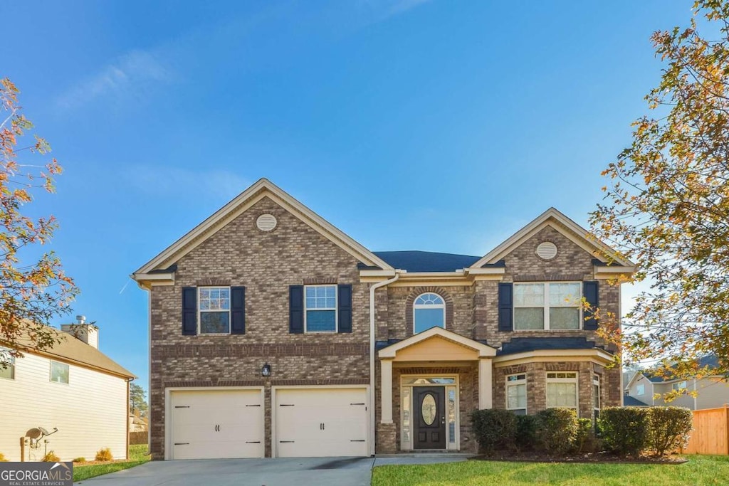 view of front of house with a garage