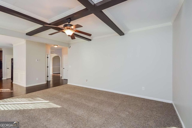 unfurnished room featuring beam ceiling, ceiling fan, coffered ceiling, dark hardwood / wood-style flooring, and ornamental molding