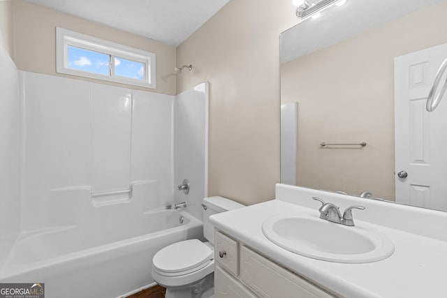 full bathroom with shower / bathtub combination, vanity, and toilet