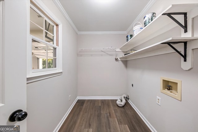 laundry room with hookup for an electric dryer, hookup for a washing machine, dark hardwood / wood-style floors, and ornamental molding