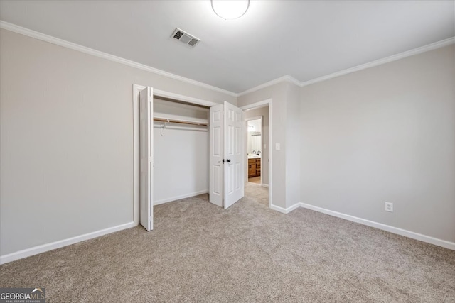 unfurnished bedroom with light carpet, a closet, and ornamental molding