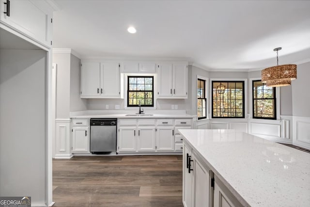 kitchen with dishwasher, decorative light fixtures, white cabinetry, and light stone counters