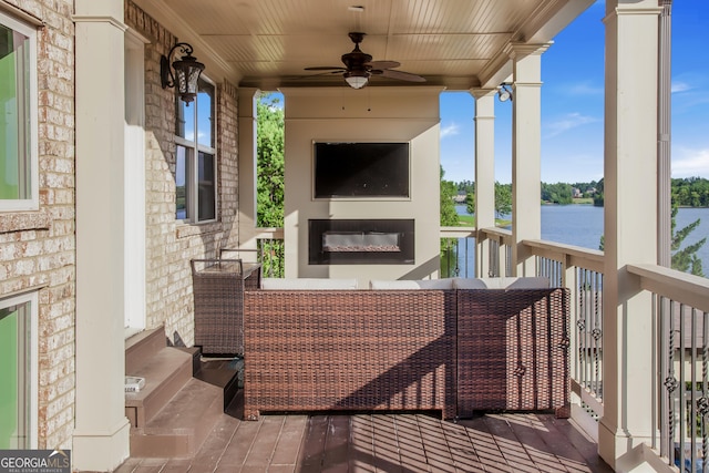 view of patio / terrace featuring ceiling fan