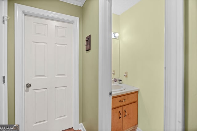 bathroom featuring vanity and a textured ceiling