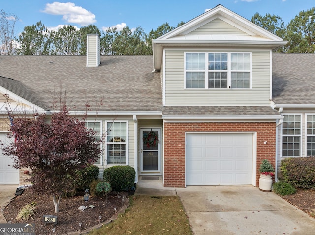 view of front of property featuring a garage