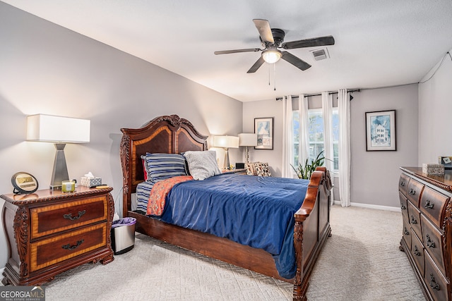 carpeted bedroom with ceiling fan